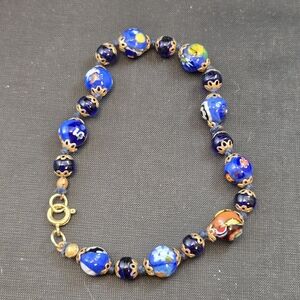 Murano Glass Beaded Blue and Gold Tone Knotted Millefiori Bracelet